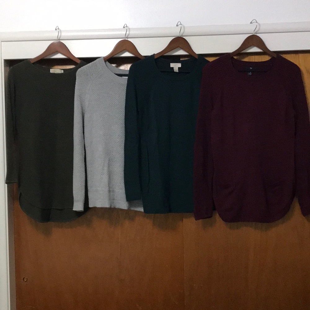 Four crew neck sweaters